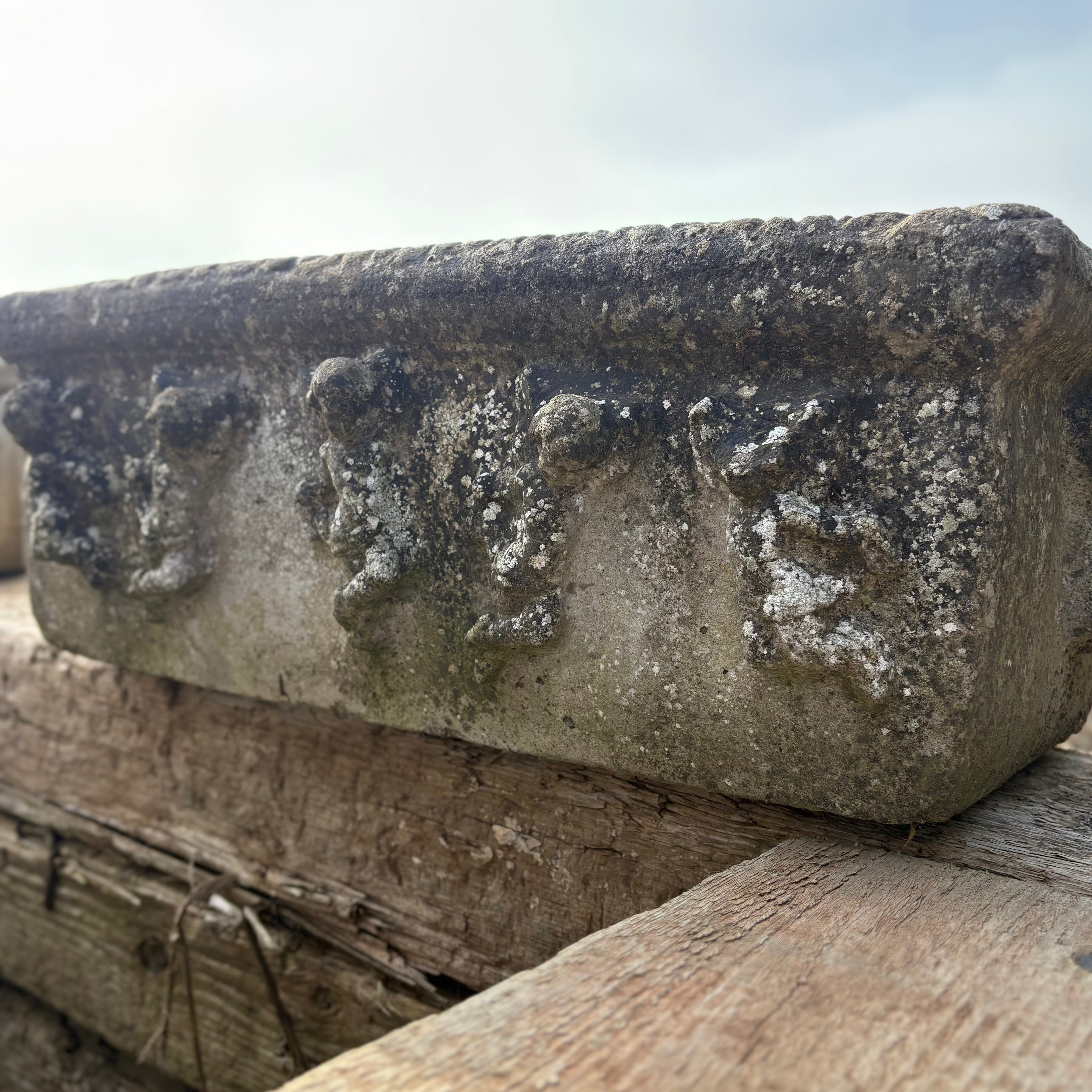 Weathered Trough Planter With Cherub Design